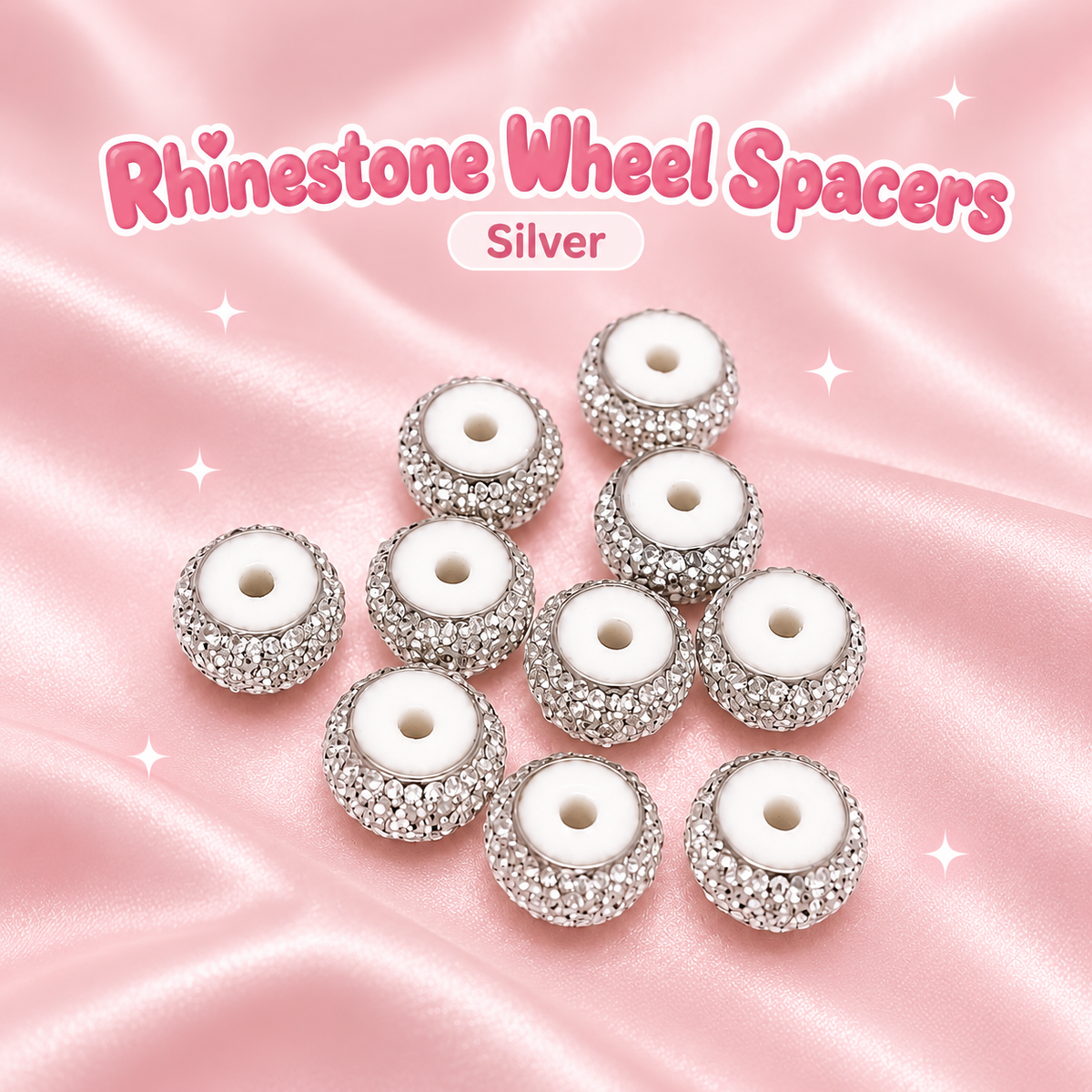 Rhinestone Wheel Spacers: Silver on a blush pink background.