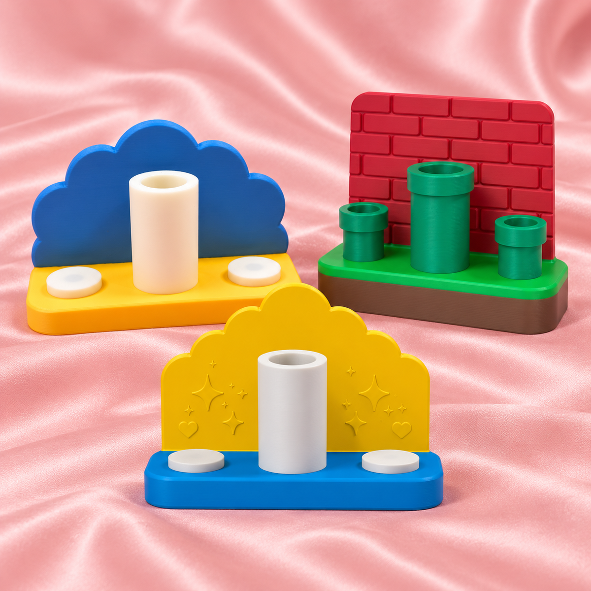 Chibi SnapCharm™ Collection Displays products on blush pink satin