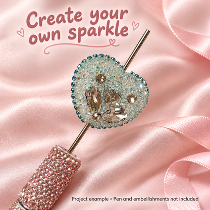 Aqua rhinestone heart plate bead on a beaded pen as a project example. Pen and embellishments not included.