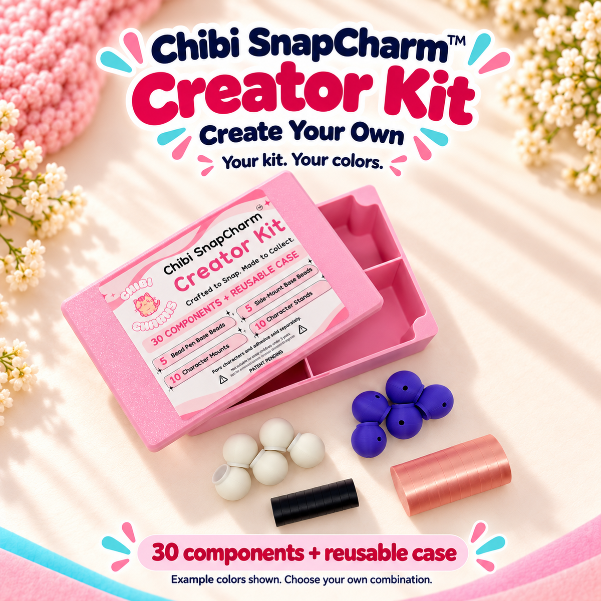 Chibi SnapCharm Create Your Own Creator Kit with reusable pink case and 30 components, shown in example colors.