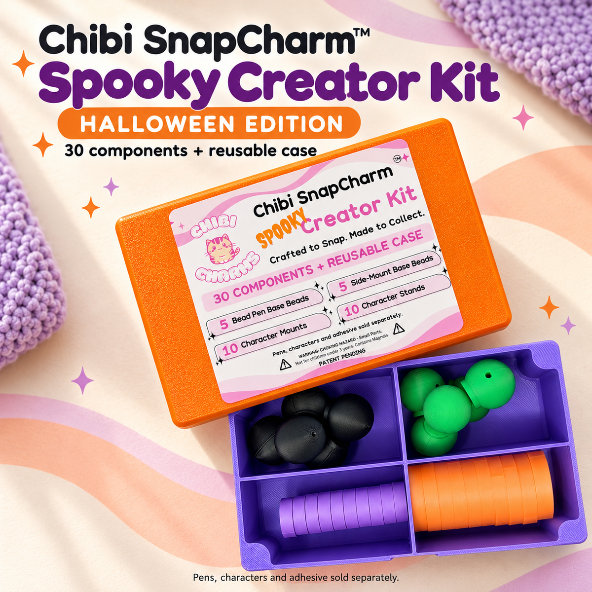 Styled Spooky Creator Kit with an orange labeled lid, purple four-compartment box and 30 black, green, lilac and orange SnapCharm components.